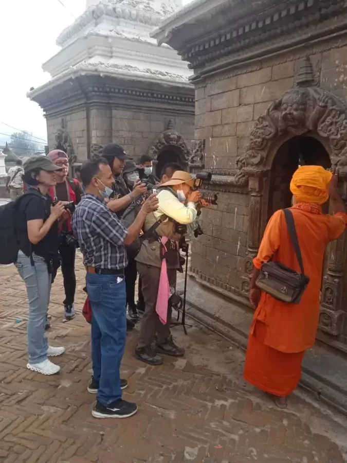 Nepal Photography Tour - Guests in Pashupatinath for iconic photo of Sadhus